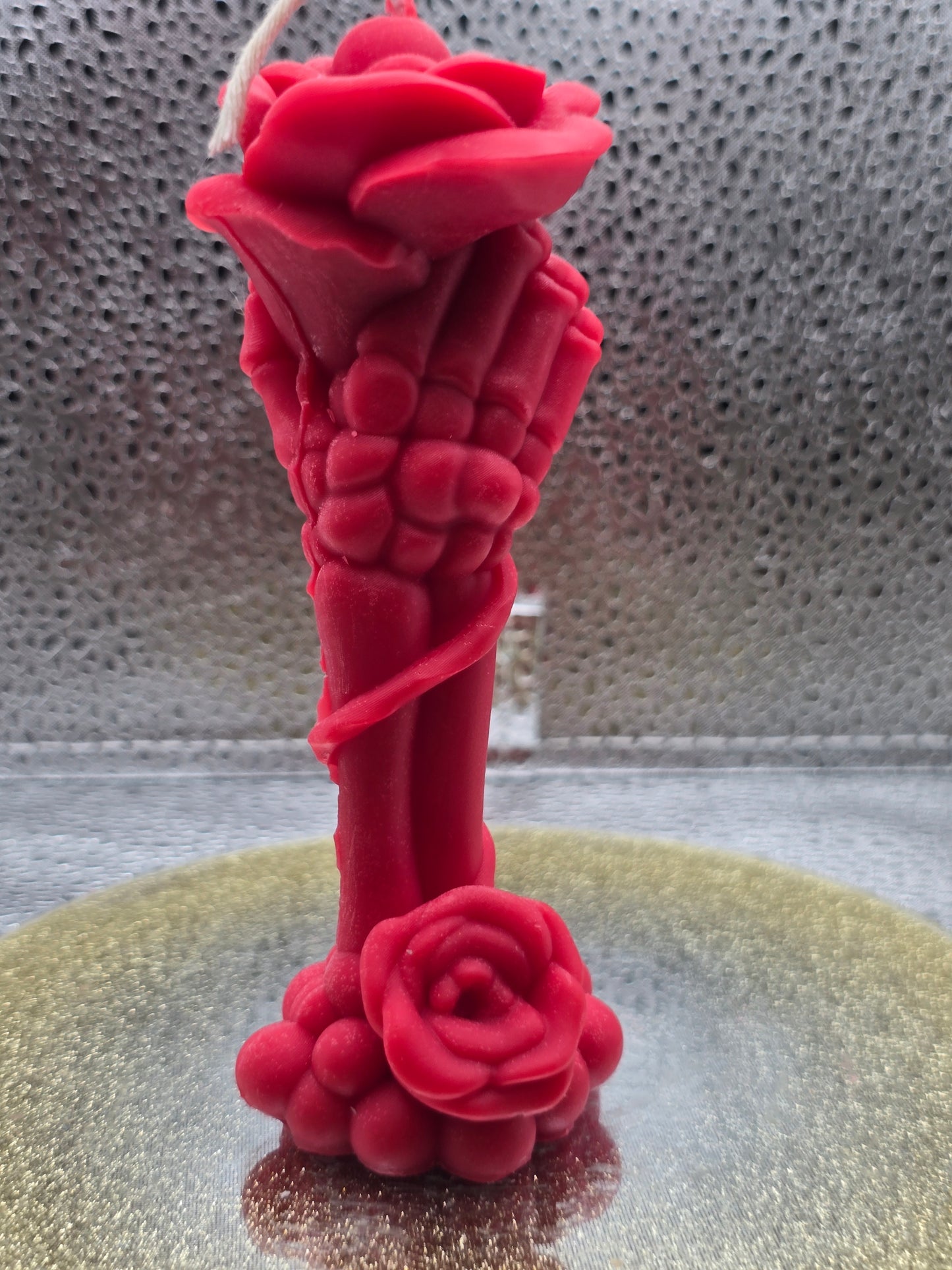 Skeletal Hand Holding Flower Candle