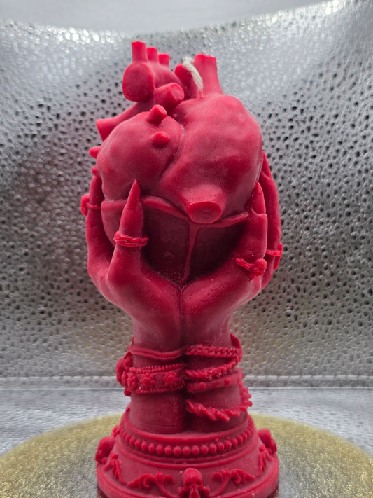Witch Hands Holding Heart Candle