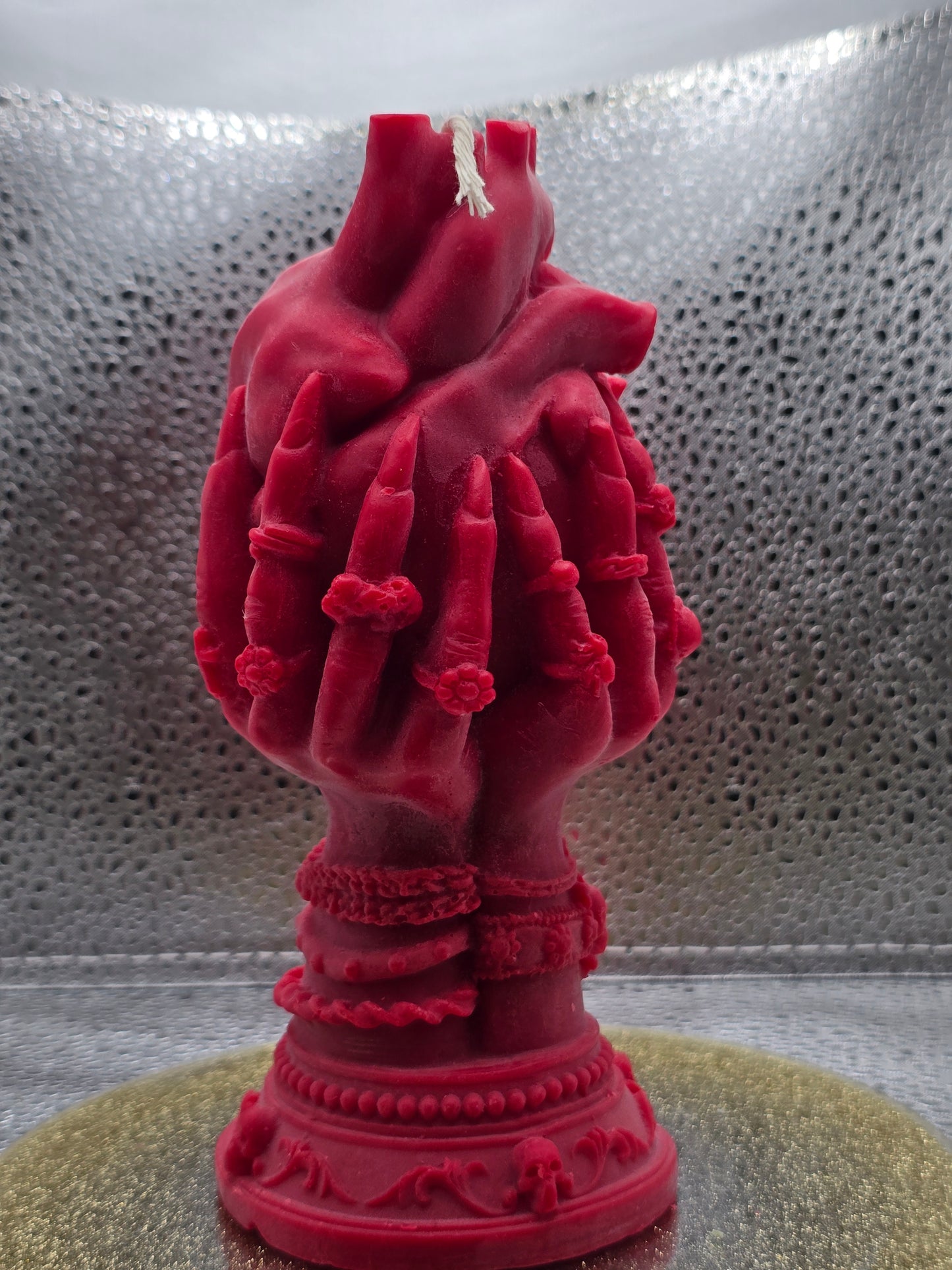 Witch Hands Holding Heart Candle