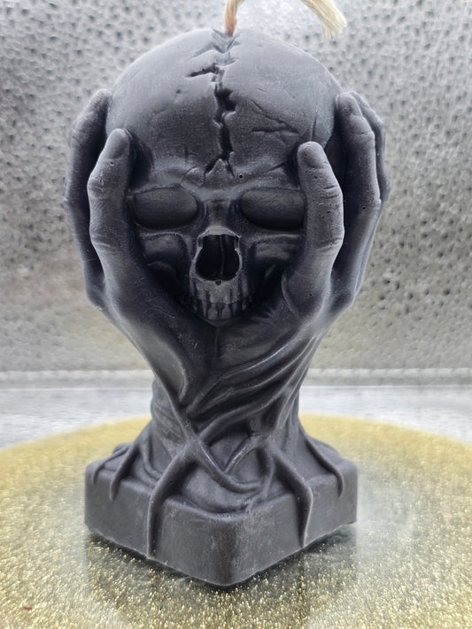 Hands Holding Skull Candle