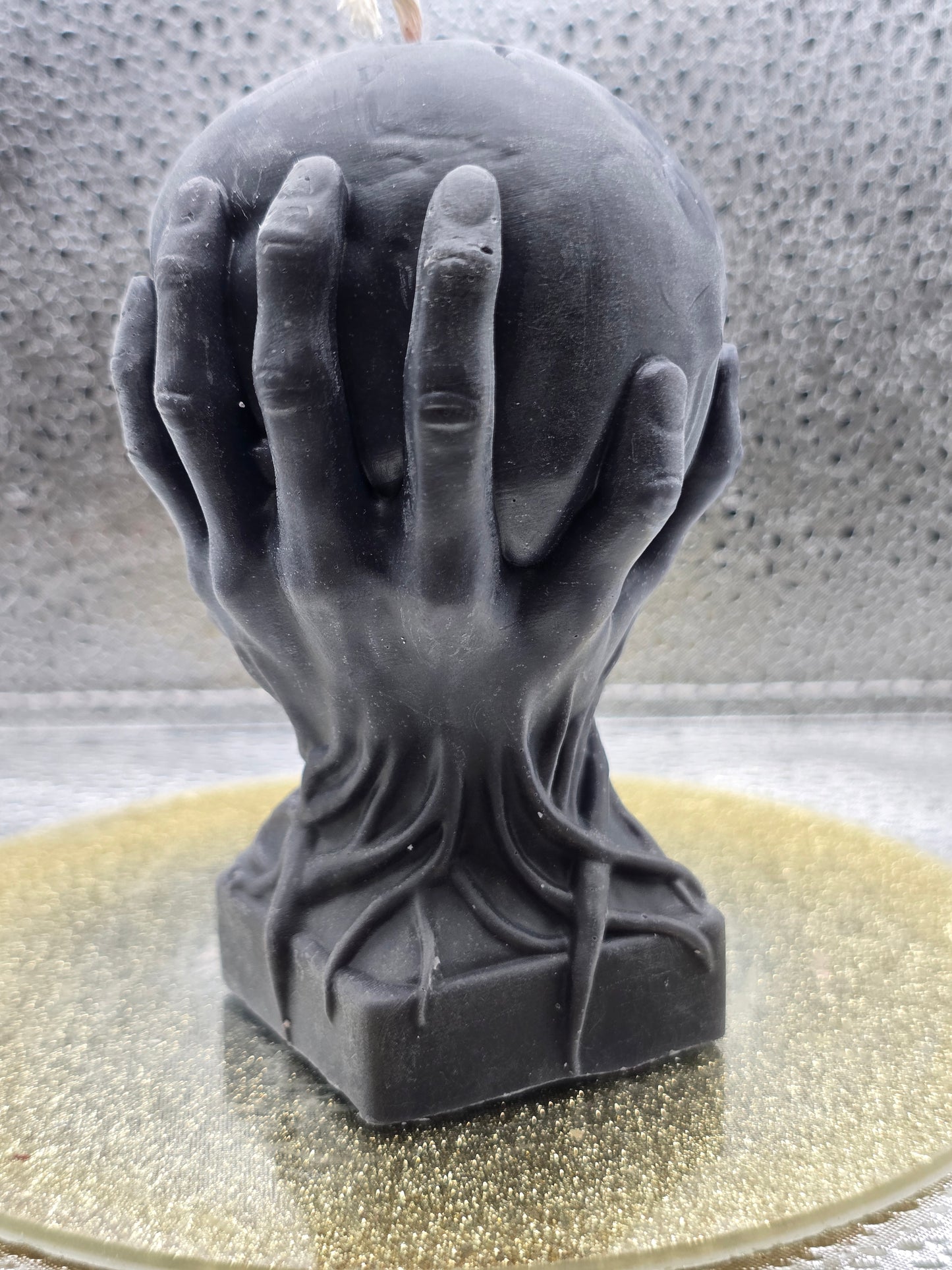 Hands Holding Skull Candle