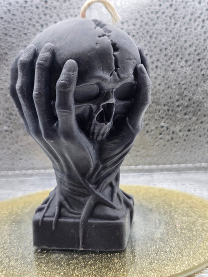 Hands Holding Skull Candle