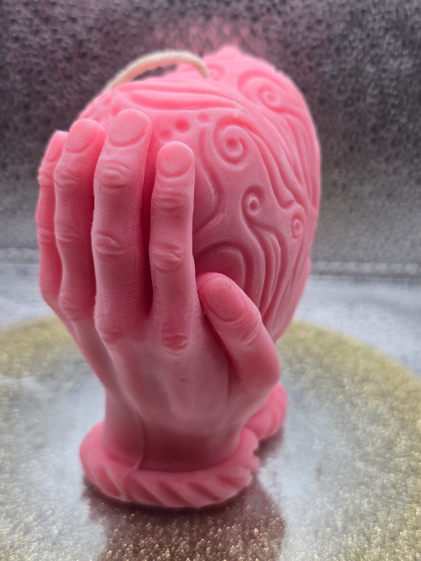 Hands Holding Heart Candle