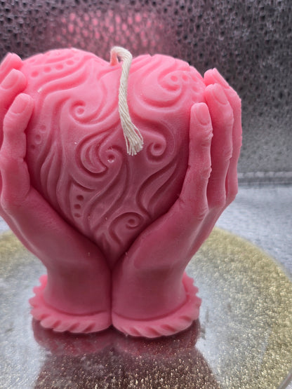 Hands Holding Heart Candle